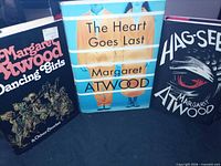 Front view of all three Margaret Atwood hardcover books