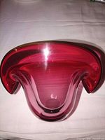 front angled view showing cranberry color and folded rim