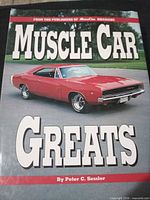 Front cover showing title Muscle Car Greats and vehicle image