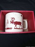mug inside original red box showing exterior woodland graphic
