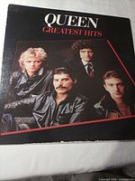 Front sleeve showing album cover photo and title