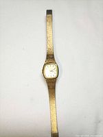 Full view of Seiko gold-tone quartz bracelet watch