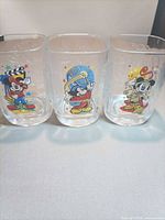 Front view of three Mickey Mouse embossed glasses