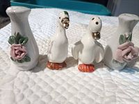 Front view of all four shakers showing design details