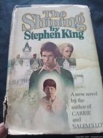 Front view of dust-jacketed book showing title, author and illustration