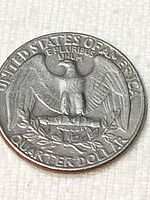 Reverse of 1973 Washington quarter showing eagle and legends
