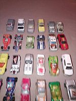 All 24 die-cast cars arranged in rows showing top view