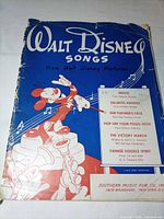 Front cover showing title, Mickey Mouse artwork, song list
