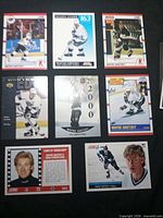 Overview of eight Wayne Gretzky trading cards from Score, Upper Deck and Pro Set