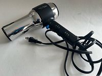 Full view of Conair Infiniti 1875 hair dryer with cord
