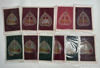 Group of 11 Bodhi silk paintings showing variety of background colors