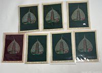 Seven Bodhi silk paintings on leaf, group shot