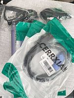 Group of packaged cables including Cerrxian HDMI cable and others