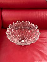 Top view showing diamond and circle cut pattern and scalloped rim