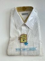 Front view of packaged white dress shirt
