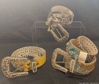 Group shot of all three rhinestone belts showing colors and buckles