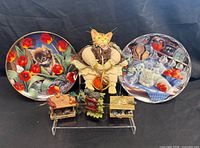 Full lot with two plates, three ornaments and cat doll