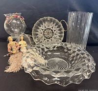 Group view showing all glassware, tray and dolls