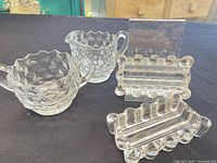 Sugar bowl, creamer, two ashtrays group view