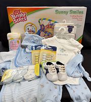 Group shot of bouncer box and all clothing accessories