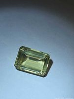 Top view of emerald-cut lemon citrine showing color and cut