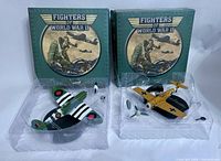 Both boxed diecast planes with packaging