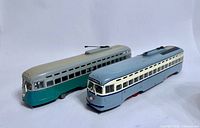 Both Corgi PCC streetcar models side by side showing scale and paint schemes