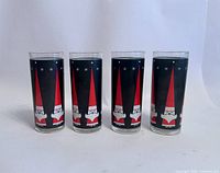 Four Santa graphic glasses front view