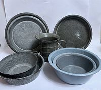 All nine granite ware pieces grouped together