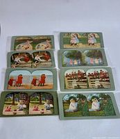 Fronts of 6 stereoscopic cards showing color child scenes