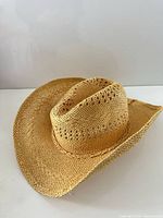 Overall view of woven straw cowboy hat
