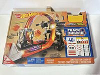 Front of Hot Wheels Track Builder Construction Crash Kit box