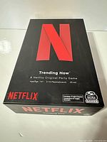 Front view of boxed Netflix Trending Now party game