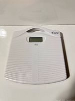 Top view of white Weight Watchers digital bathroom scale showing LCD display and logo