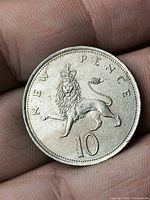 Reverse side showing crowned Lion of England, denomination 10, NEW PENCE legend