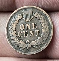 Reverse side showing ONE CENT within oak wreath and shield