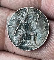 Reverse of 1904 farthing showing Britannia seated, date visible