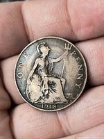 Reverse: Britannia design and date 1918 visible