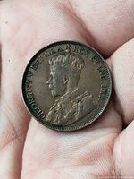 Obverse showing King George V portrait and legend GEORGIVS V DEI GRA REX ET IND IMP