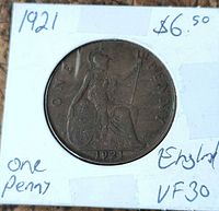 Reverse of 1921 British penny in flip showing Britannia design