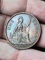 Reverse showing Britannia, legend ONE PENNY, date 1938