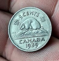 Reverse of 1939 Canadian 5-cent coin showing beaver design and date
