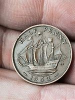 Reverse view showing HALFPENNY legend, sailing ship design, date 1952