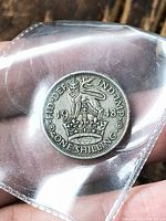 Reverse of 1948 one-shilling coin showing crowned lion design and date