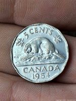 Reverse side with beaver design and 1954 date