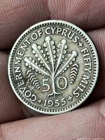 Reverse side showing denomination 50, GOVERNMENT OF CYPRUS • FIFTY MILS • 1955 legend