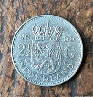 Reverse showing crowned Dutch coat of arms, denomination, date