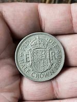 Reverse with crowned quartered shield and legend F·D·DEF·E·R· HALF CROWN 1960