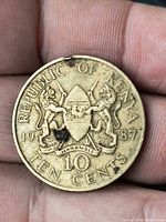 Reverse side showing coat of arms, denomination, year 1987