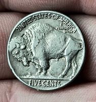 Reverse of 1937 Buffalo nickel showing bison and FIVE CENTS legend